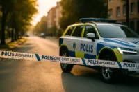 Polisfordon och avspärrningsband