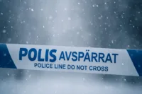 Polisavspärrning i snöigt väder